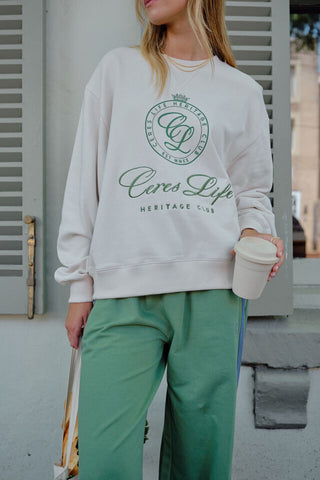 Romy Crew/Buff Pistachio Club Logo